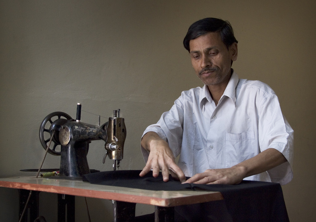 Tailor and old vintage sewing machine, Varanasi Benares India