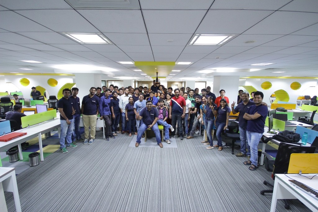 Kunal Shah, Co-Founder and CEO, FreeCharge with employees in new office